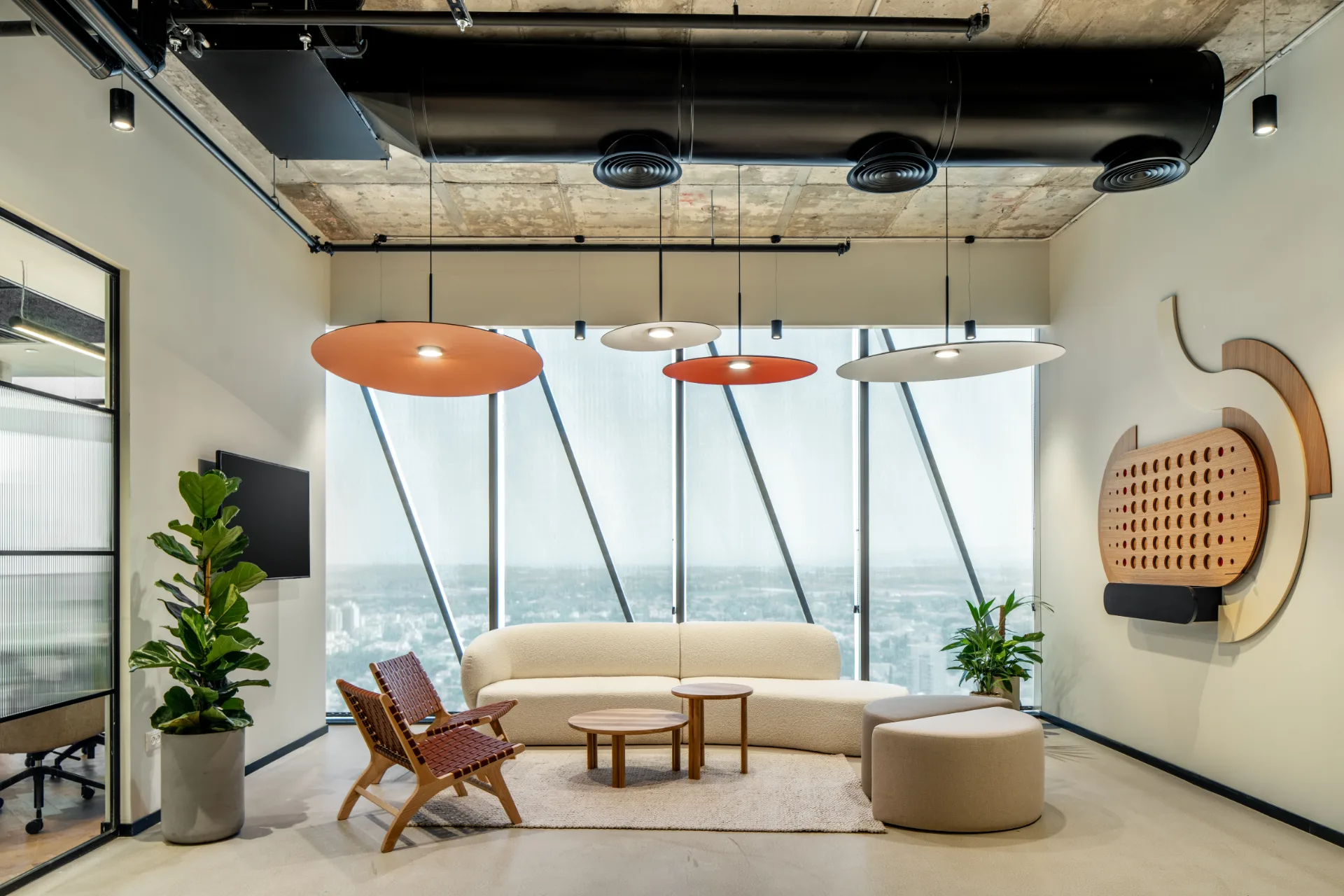 Lounge with colourful pendants and views