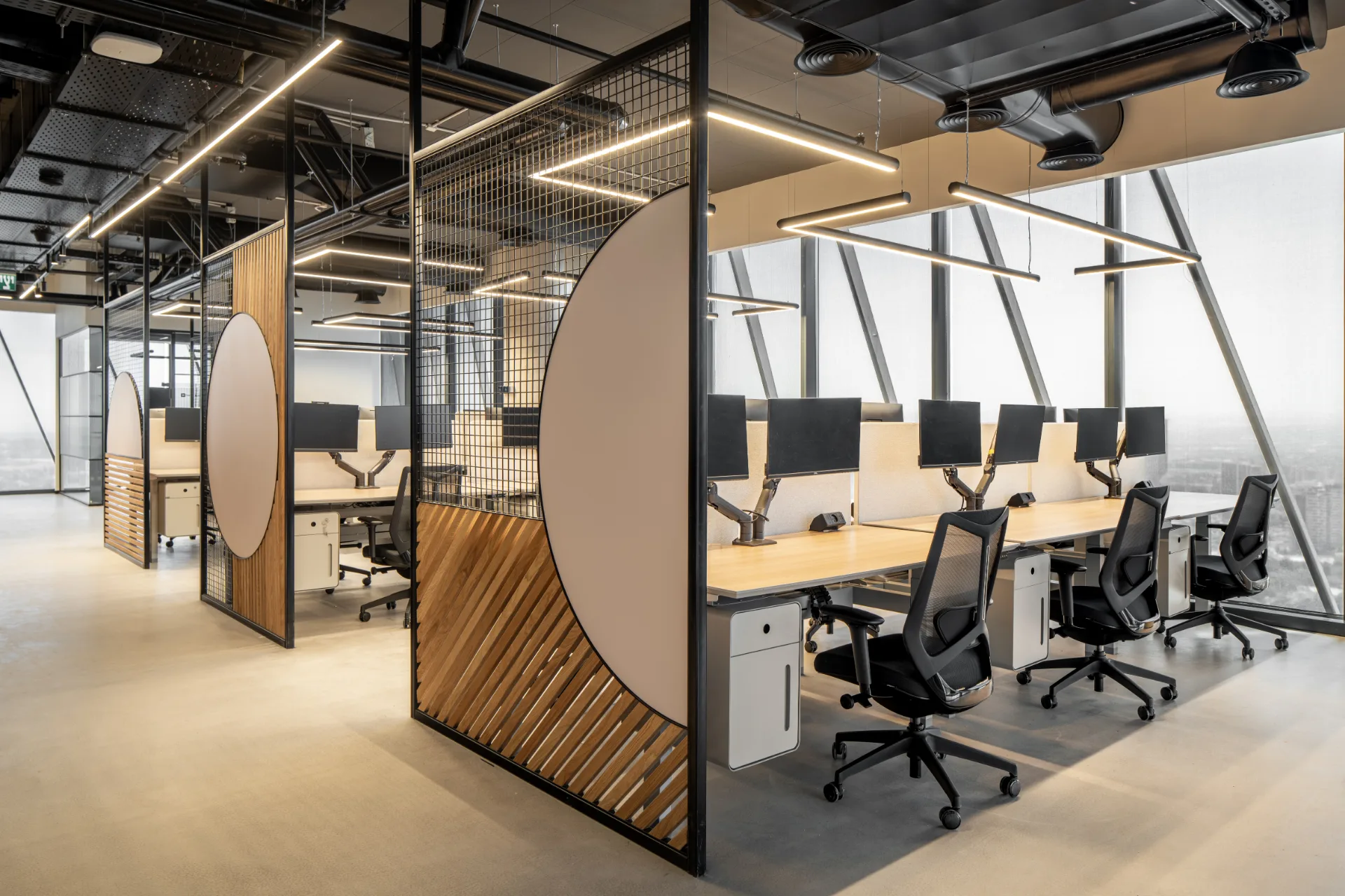 Workstations with curved timber partitions